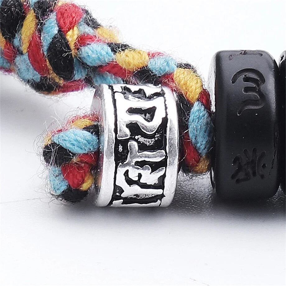 SUTRA ~ Bracciale Tibetano in legno di cocco con mantra incisi e cordino tibetano