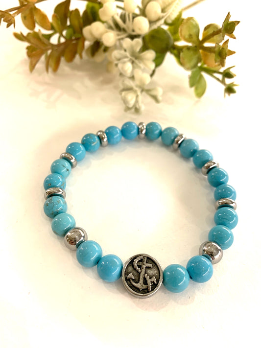 SPIRITUAL SEA  -  Bracciale elasticizzato in pietra dura - turchese naturale - con simbolo marino in acciaio inossidabile